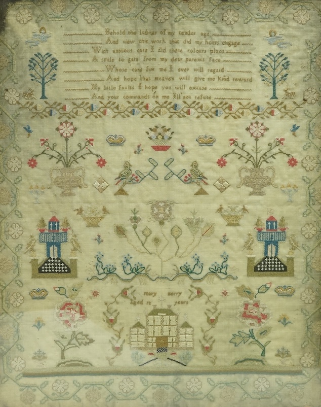 A large framed early 19th century sampler (undated), worked by Mary Berry. The sampler finely worked with angels either side of a verse and with spot motifs of crowns, birds, trees, deer and baskets of flowers. Either si